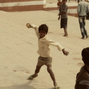 children playing Maram Pitti (Dodgeball) on ghats of Varanasi